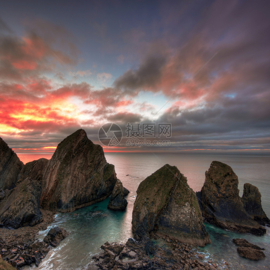 日出在爱尔兰海岸反射季节性飞行天空国家裂缝蓝色天鹅黑暗季节图片