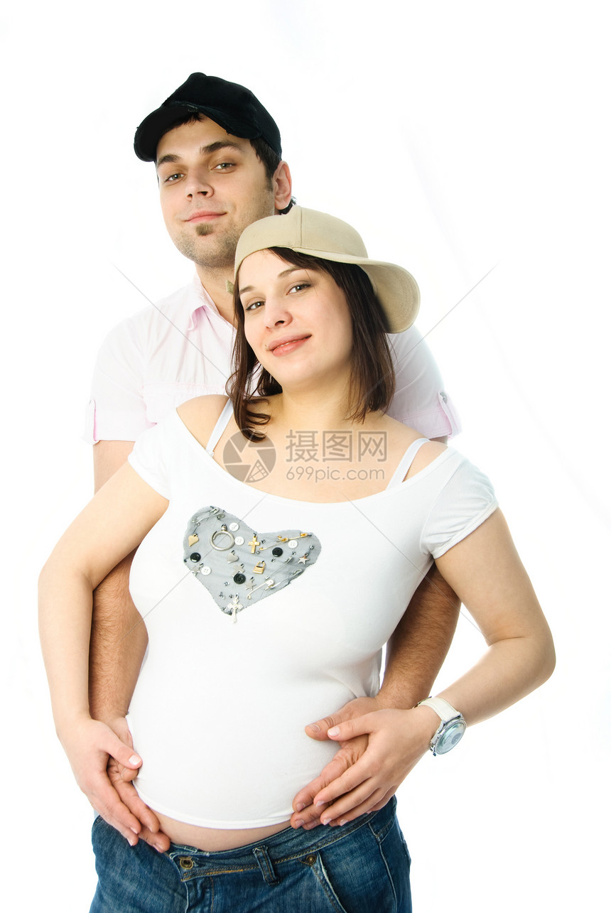年轻 美丽的怀孕少女及其丈夫;图片