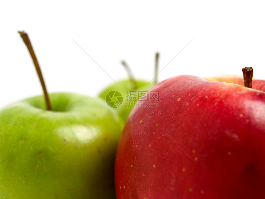 红苹果和绿苹果枝条花瓣脆弱性饲料季节美食橙子蔬菜盘子水果图片