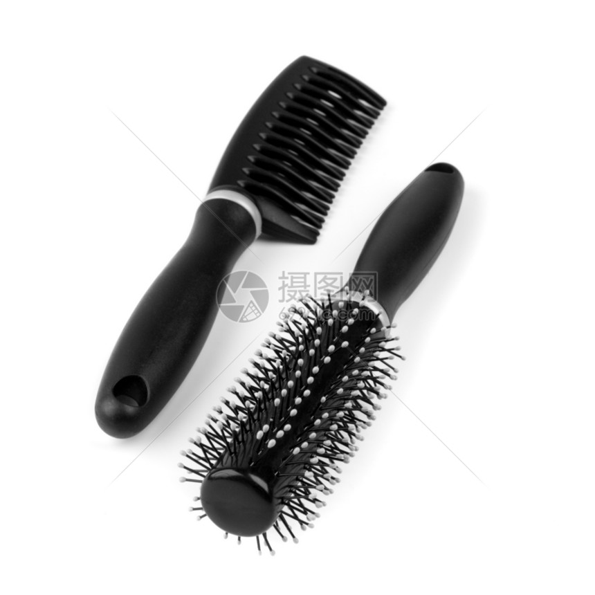 两根梳子理发师女性化妆品沙龙黑色工具头发护理造型白色图片