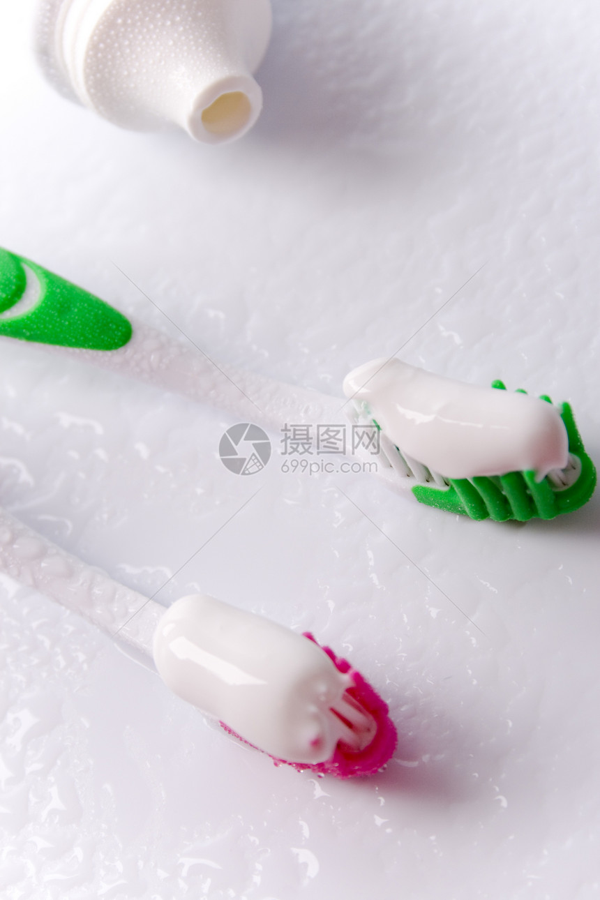 牙膏和牙刷化妆品美丽白色产品福利管子绿色牙科粉色茶点图片