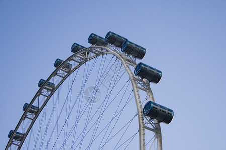 新加坡飞轮记录蓝色圆形天空世界车轮结婚传单街道背景图片