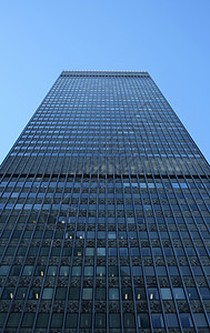 高楼大楼摩天大楼企业蓝天中心生长玻璃窗蓝色商业城市几何背景图片