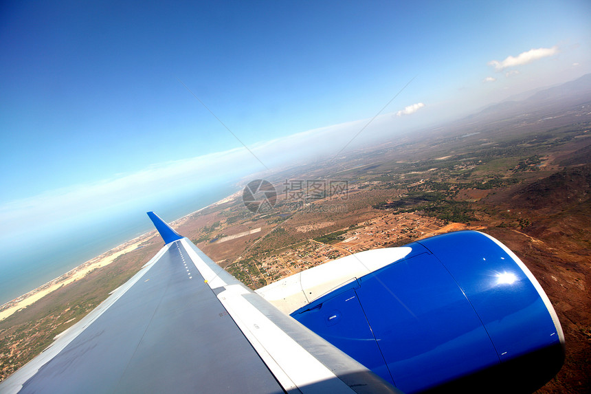 飞机飞行空气气氛天空蓝色地球旅游土地飞机场航空翅膀图片