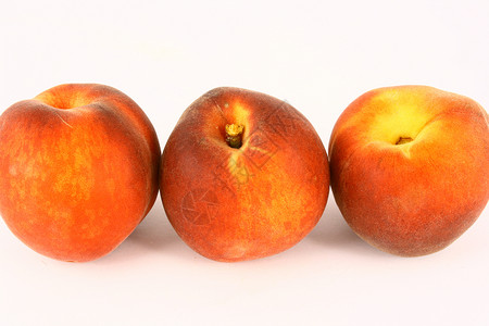 桃绿色黄色橙子红色水果健康营养桃子白色背景图片