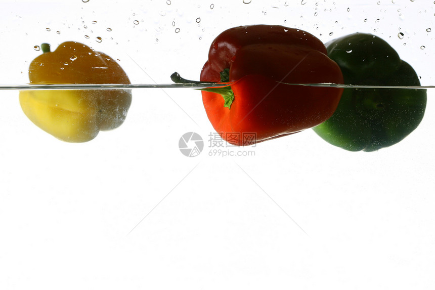 螺旋喷洒沙拉饮食食物红辣椒辣椒农场橙子烹饪宏观水果图片