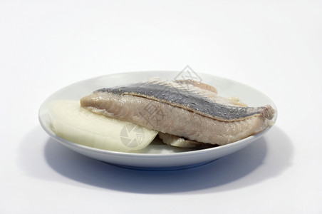 鲱鱼市场盘子食物盐渍餐厅白盘子海洋小吃产品零售背景图片
