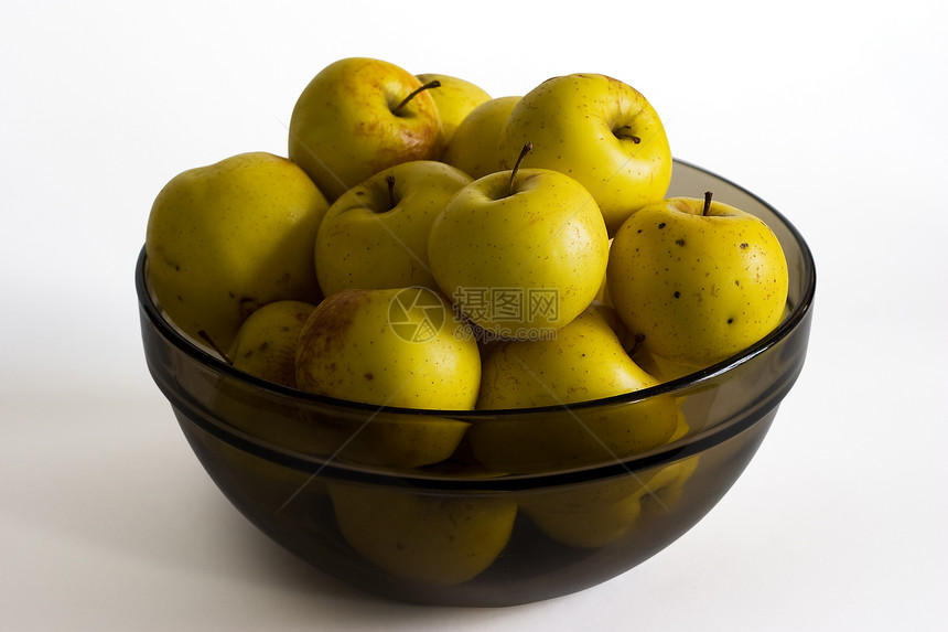 玻璃碗中的黄苹果图片