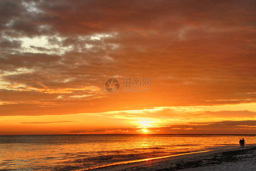 日落旅游文化晴天气候闲暇海滩太阳海景金子假期图片