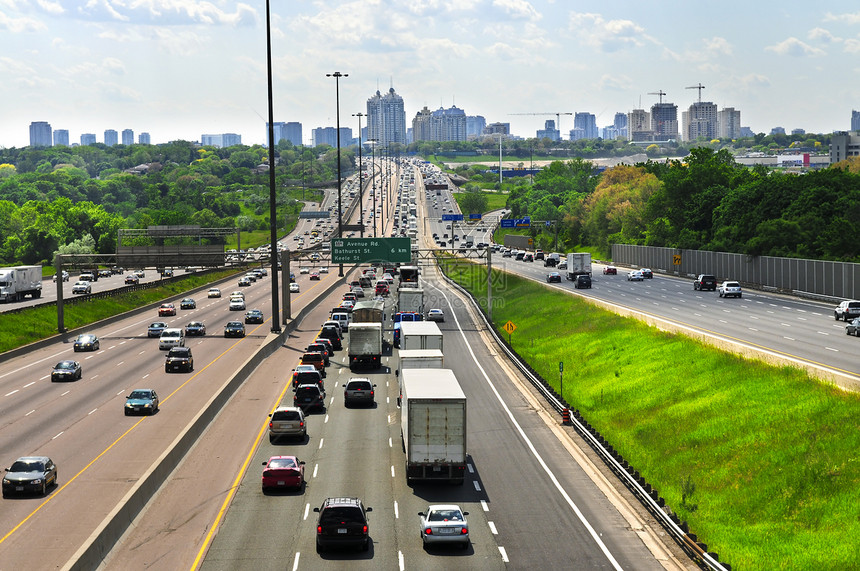 繁忙高速公路城市运输地平线车道小时大路通勤者卡车道路驾驶图片