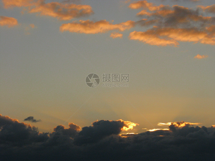 日落旅行热带海岸天空橙子海洋波浪旅游地平线射线图片