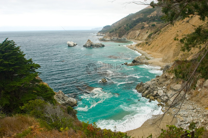 大南海岸麦威悬崖日落波浪顶峰瀑布公园岩石爬坡图片