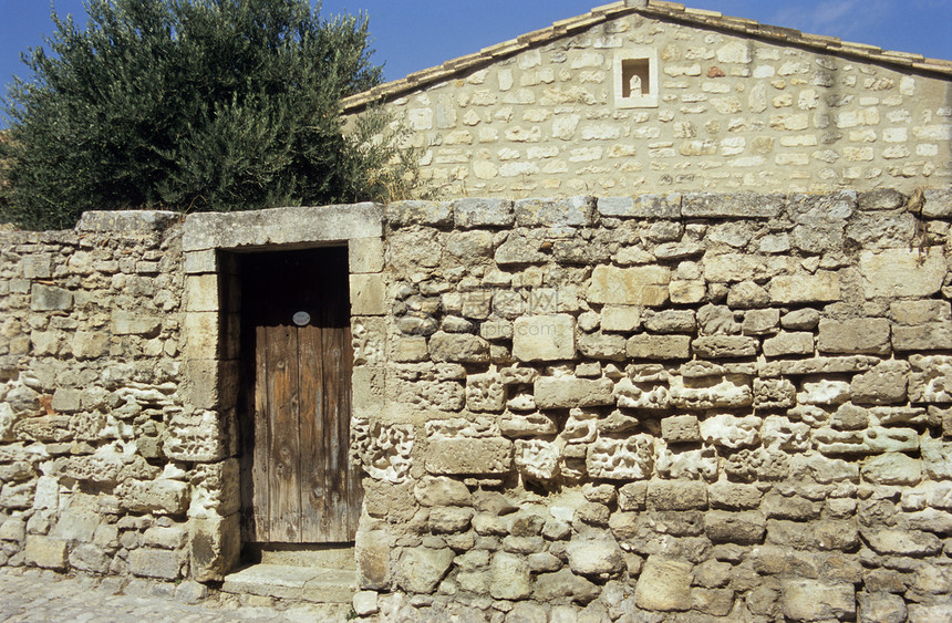 古代石墙砂岩窗户太阳岩石房子游客国家农村旅游住宅图片