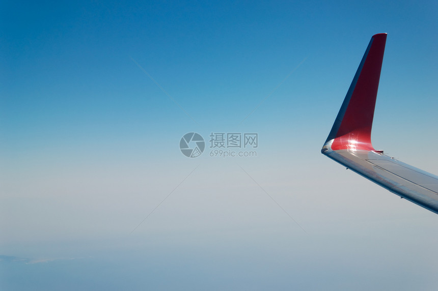 机翼和空中飞机反射翅膀坡度飞行金属地平线天空蓝色图片