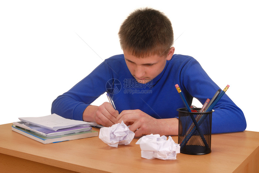 做家务的男孩学习学校家庭作业写作白色桌子笔记本男性教育意义图片