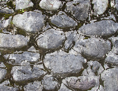 旧石墙石头圆形矿物灰色材料墙纸岩石背景图片