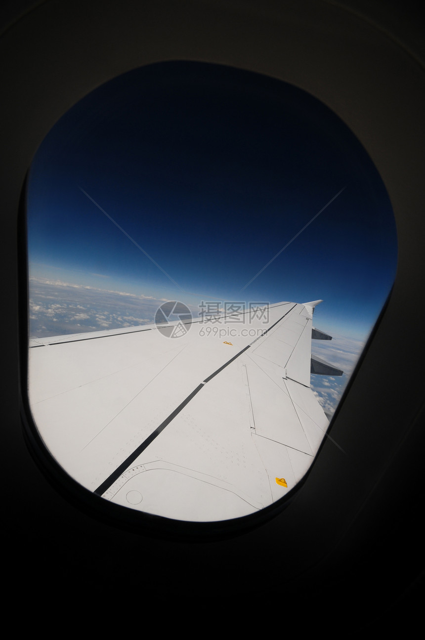 飞行喷射航班飞机窗户蓝色旅行运输航空公司高度地球图片