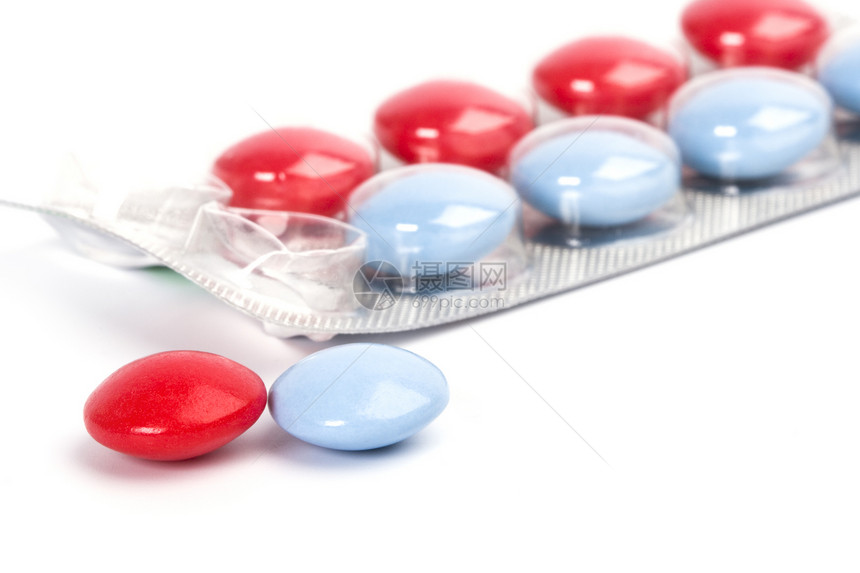 红色和蓝色药丸胶囊药片店铺宏观药物医院预防性药剂疾病白色图片