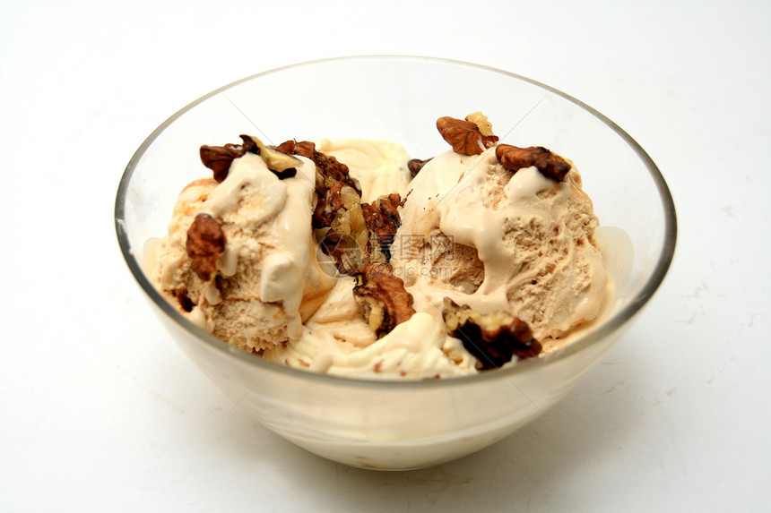 坚果和栗子冰淇淋棕色白色玻璃甜点奶油鞭打奶油状水晶水果红色图片