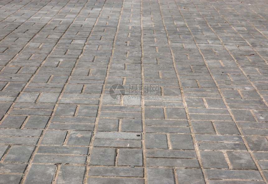 人行道街道地面瓦砾材料鹅卵石建造大街建筑学石头正方形图片