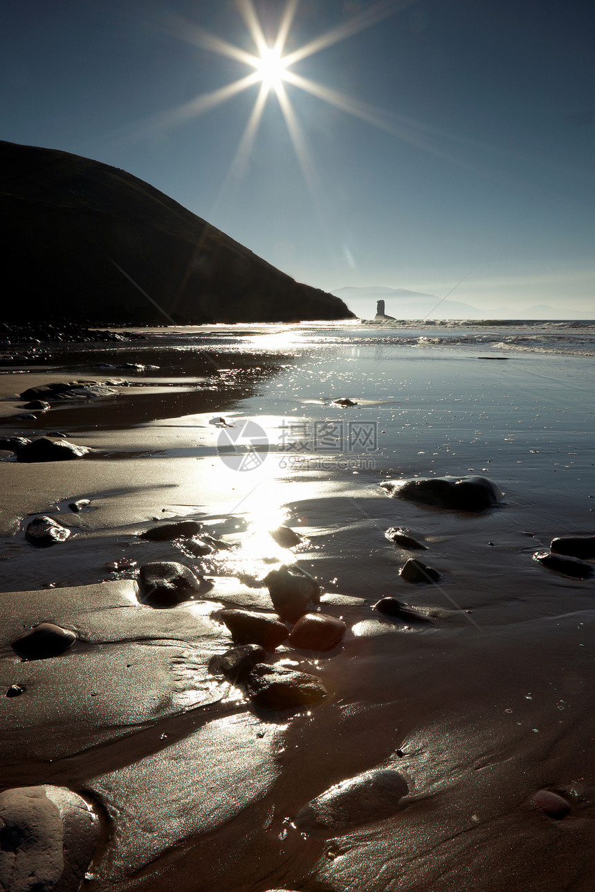 爱尔兰科克里Kinnard太阳岩石波浪海洋巨石图片