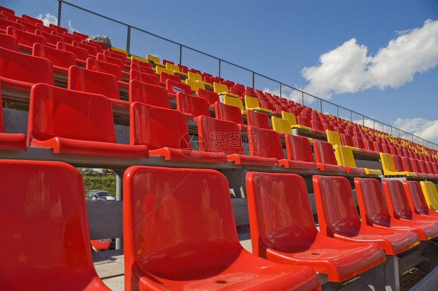 彩色座位的线条假期休息音乐会水平椅子剧院天空体育场团体黄色图片