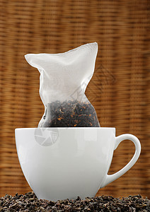 玉米丝绸茶袋茶花生物杯子树叶植物背景图片