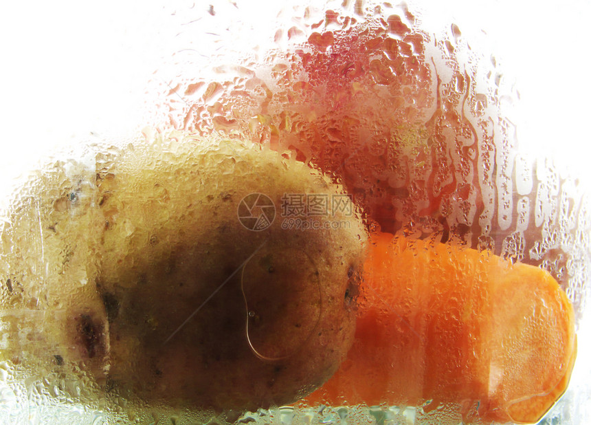 胡萝卜和土豆食物概念性静物蒸汽蔬菜图片