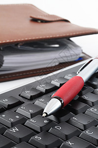 计算机键盘和组织器笔记本桌子桌面商业时间工作空白黑色技术办公室背景图片
