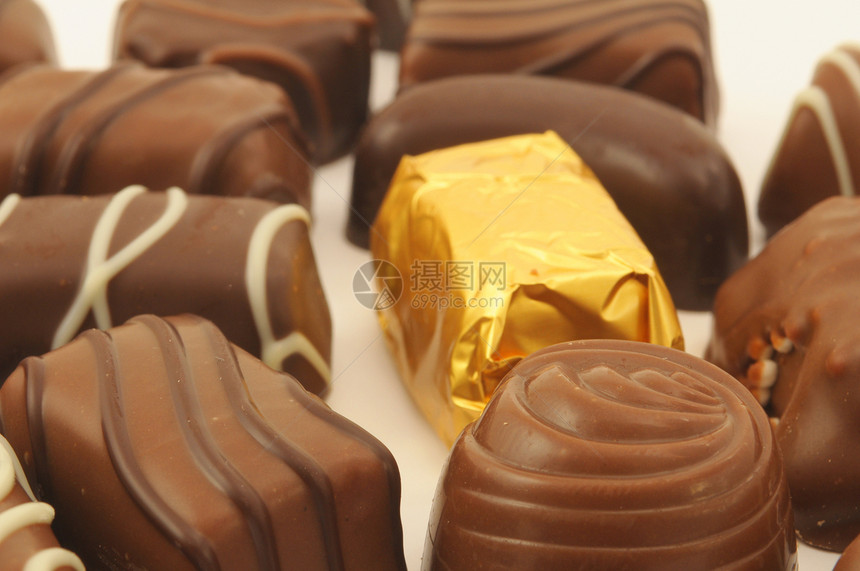 独家巧克力礼物展示金子糖果收藏营养宏观盒子棕色食物图片