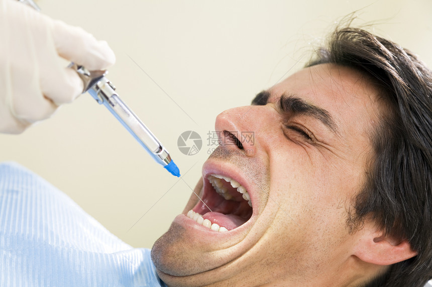 牙医外科设备痛苦男人麻醉手套诊所手术医学牙科图片