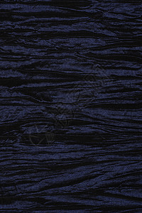 黑色细节皱纹折痕宏观反光纺织品线程背景图片