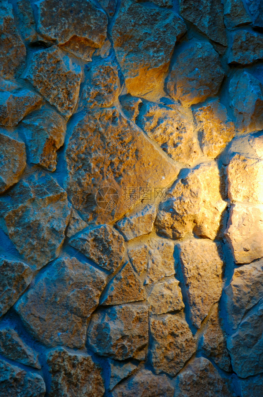 墙石头蓝色建造黄色宏观建筑学材料正方形鹅卵石荒野图片