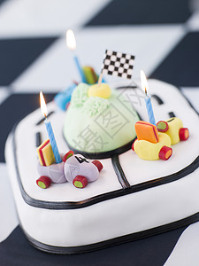 车形蛋糕素材赛车生日蛋糕甜食软糖烹饪蜡烛食谱蛋糕旗帜甜点周年孩子们背景