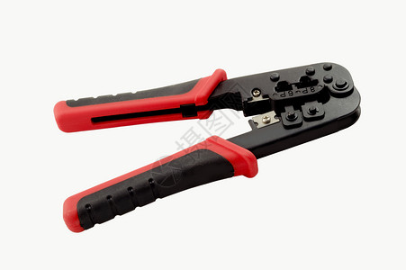 堆积工具插头刀具卷边金属局域网电缆连接器网络红色背景图片