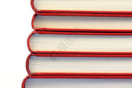 书本堆叠宏观出版物闲暇红色奖学金知识收藏学习负载背景图片
