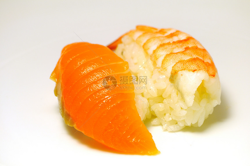 日食寿司鱼片午餐海洋筷子盘子文化便当蔬菜寿司红色图片