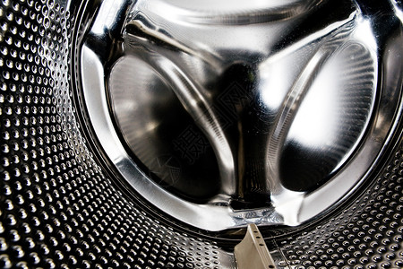 洗衣机内机器器具圆形金属圆圈合金黑色工业洗衣店背景图片