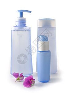 蓝色化妆品皮肤洗发水淋浴盒子塑料软木罐子浴室产品瓶子背景图片
