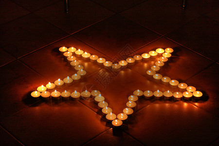 蜡烛星星宗教黑色烛台死亡桌子火焰蜂蜡背景图片