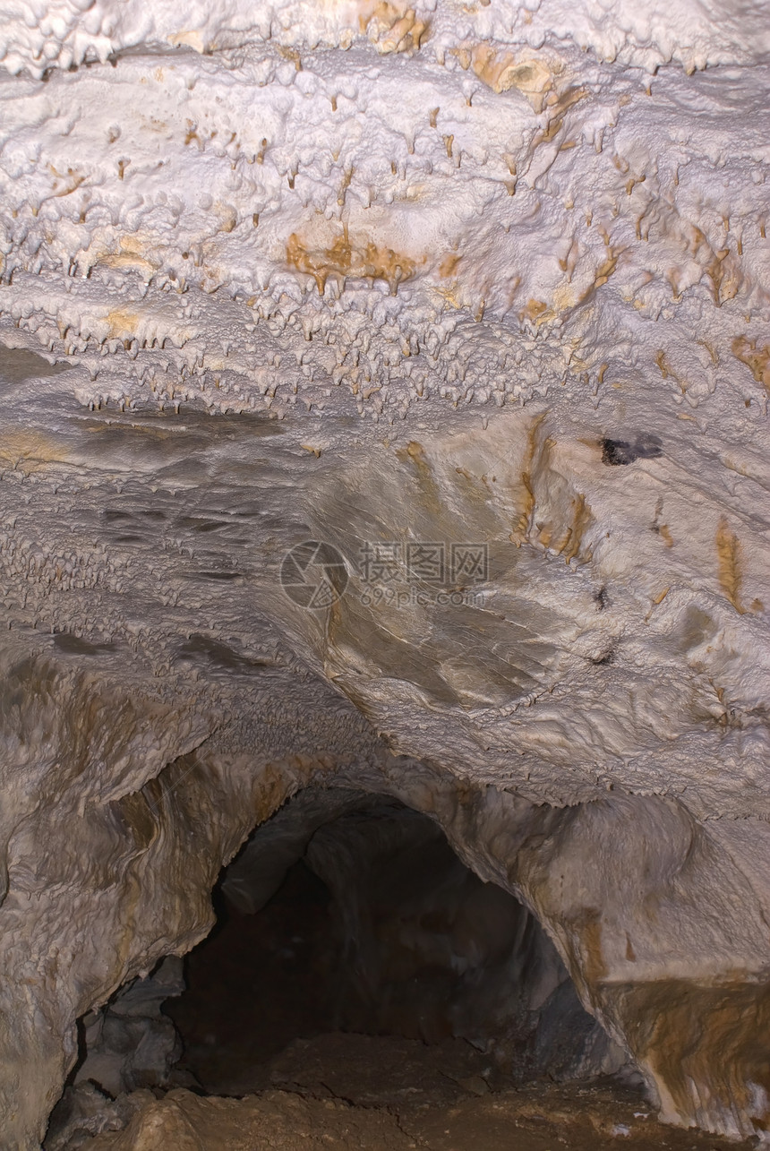 洞穴中硫酸盐的纹理地质学乳石冒险风景矿物光钟旅行反射洞穴学石笋图片