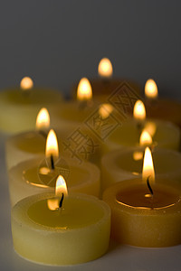 茶灯蜡烛庆典烛光烛台照明烧伤茶色火焰背景图片