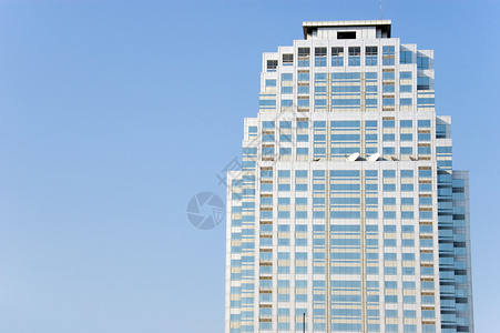 摩天大楼城市镜子反射建筑建筑学外观蓝色办公室商业窗户背景图片