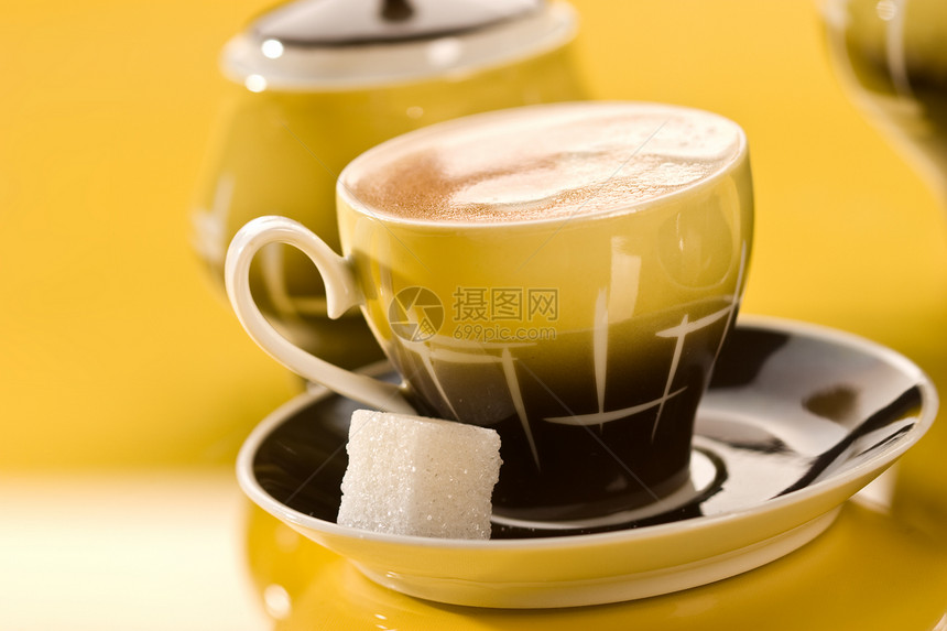 咖啡黄色勺子杯子图片