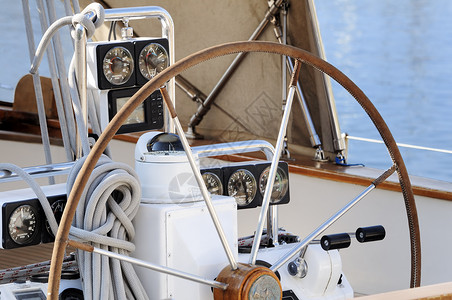 船的方向盘右转器航行航海绳索游艇运动驾驶车轮帆船赛仪器帆船背景