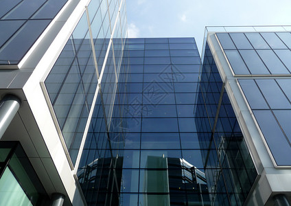 Brand 新现代玻璃大楼建筑办公室建筑学财产反射玻璃职场反光现代主义背景图片
