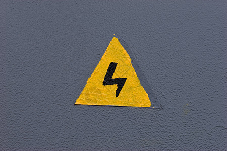 危险金属闪电黄色警告灰色背景图片
