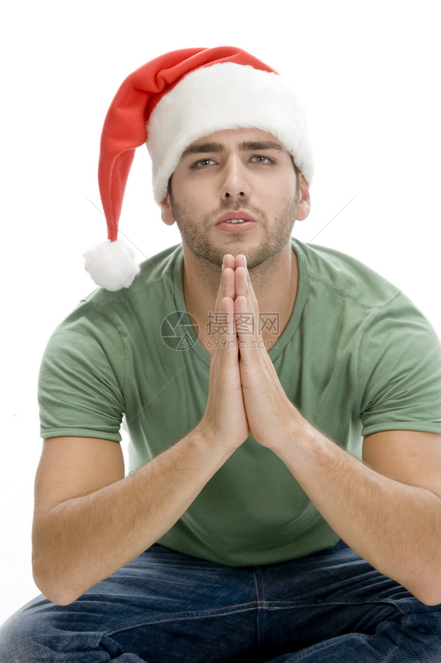祈祷的人用圣塔帽大块头姿势男人冒充衣服青年男性工作室成人白色图片