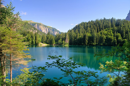 托福英语考试托福湖湖森林岩石高度天空顶峰反射蓝色树木风景全景背景