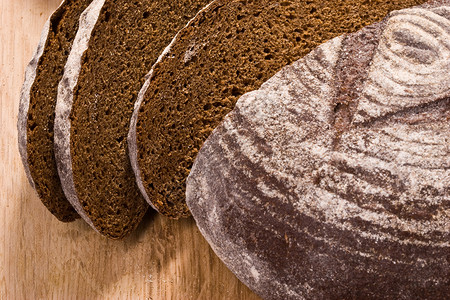 褐色面包面包圆形棕色食物营养大块头背景图片